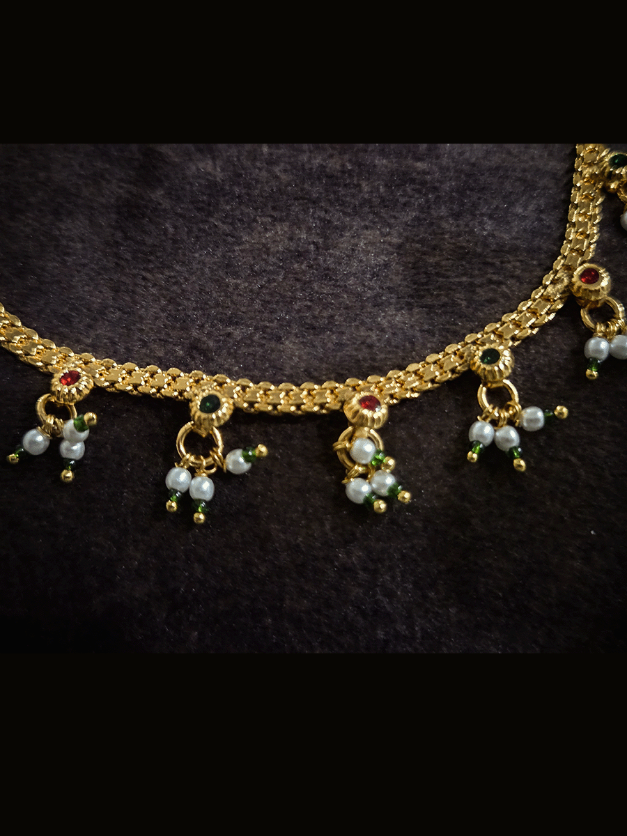 Triangular ruby stone with AD outline 3cm diameter nath