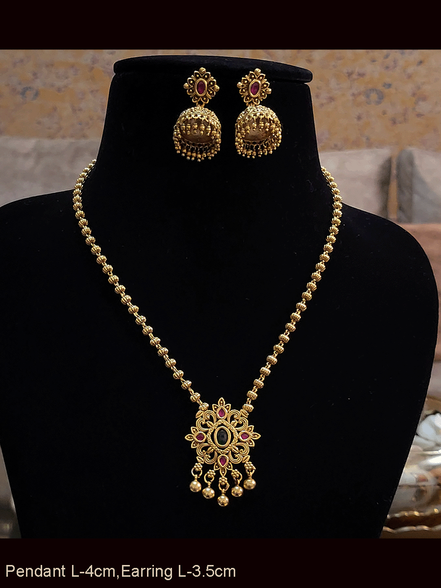 Ruby and green stones studded pendant set in gold bead chain