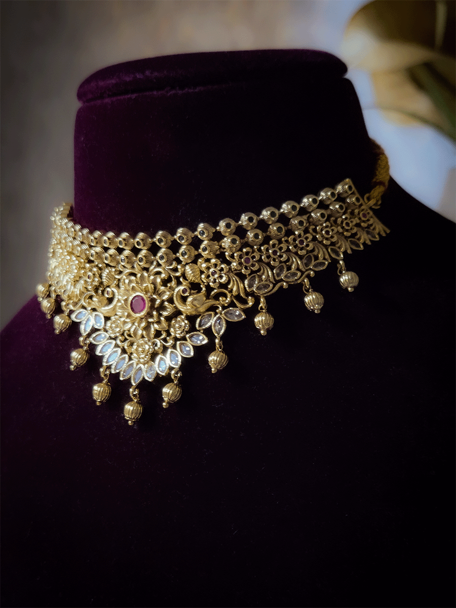 Ruby stone flower center with peacock sides intricate design polki set