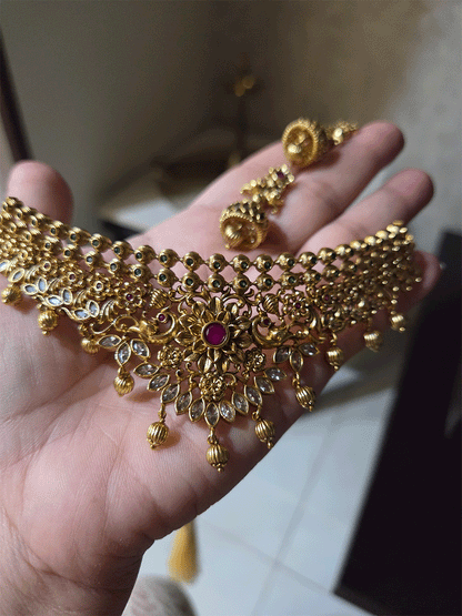 Ruby stone flower center with peacock sides intricate design polki set