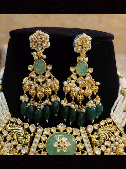 Paachi kundan set with mint green oval center stone with kundan work