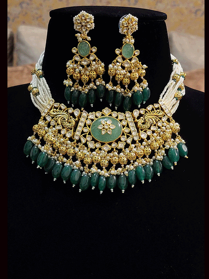 Paachi kundan set with mint green oval center stone with kundan work