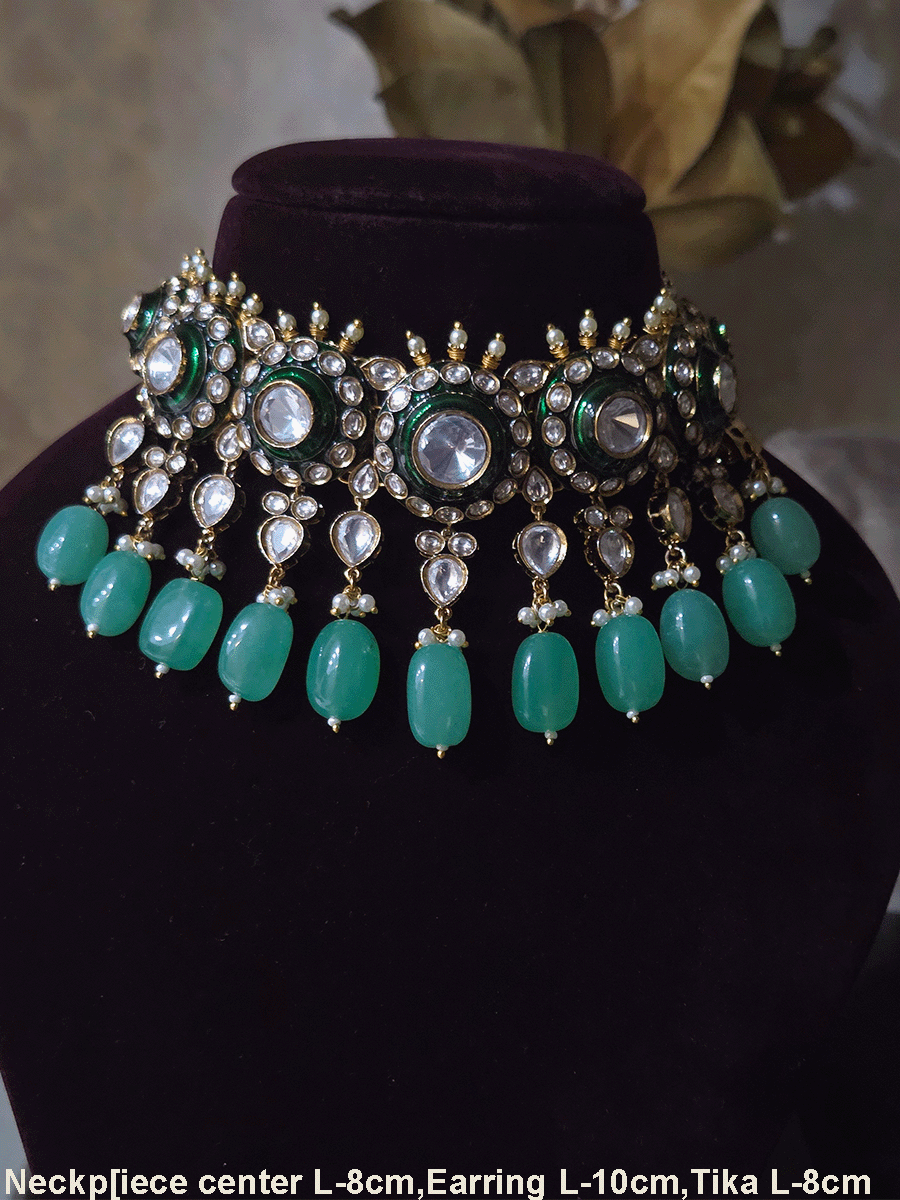 Circular uncut polki set with top bead detailing and green enamel work