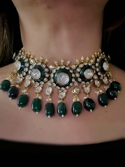 Circular uncut polki set with top bead detailing and green enamel work