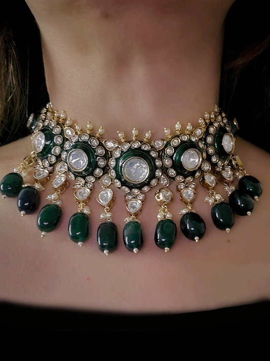 Circular uncut polki set with top bead detailing and green enamel work