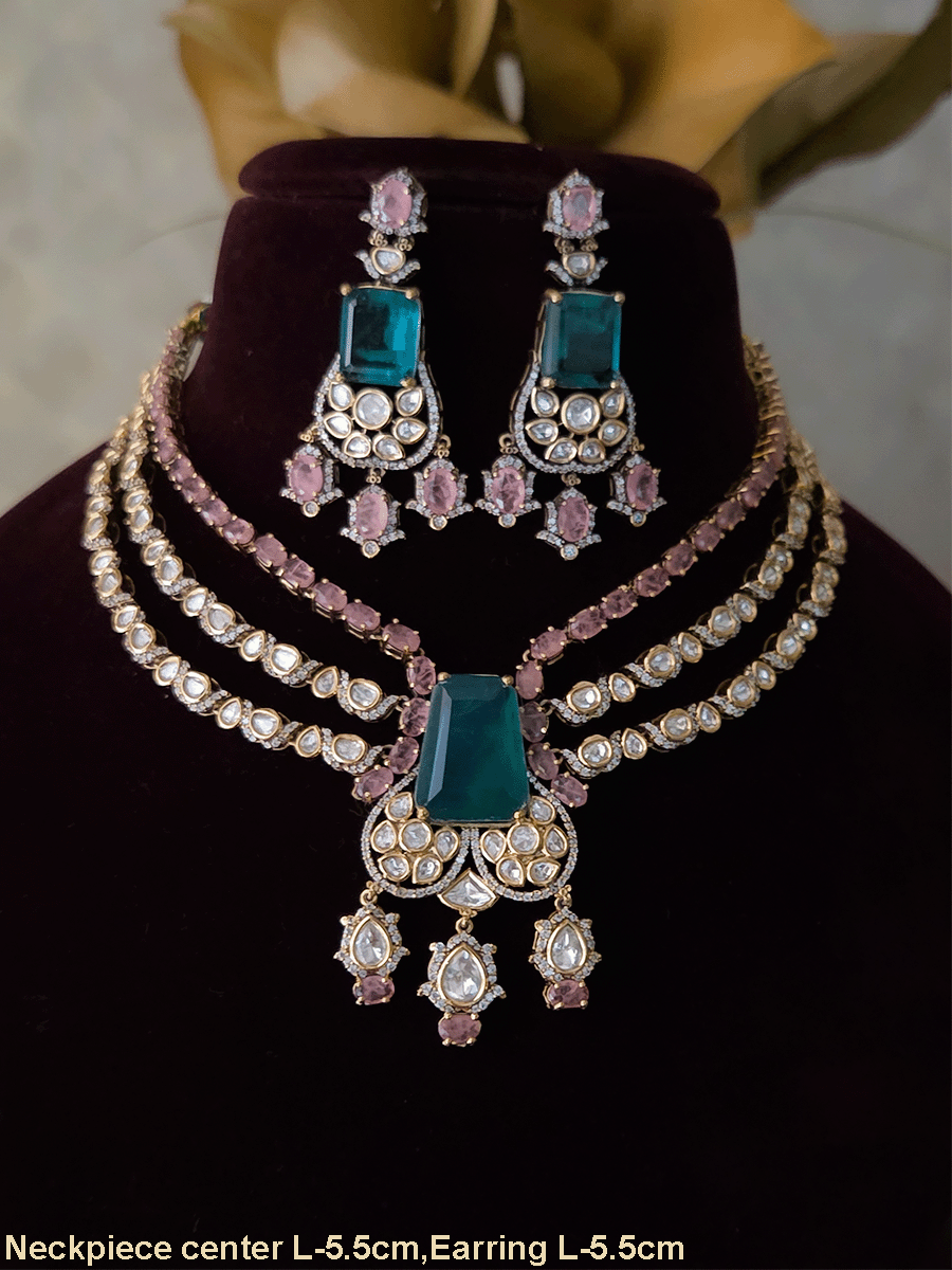 Three layer moissanite set with green stone center and one coloured stone layer
