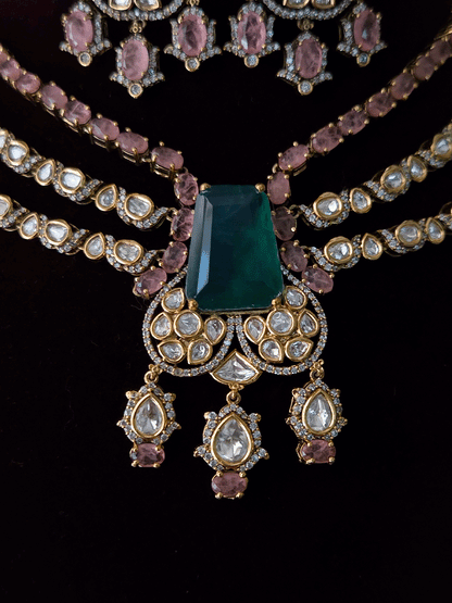 Three layer moissanite set with green stone center and one coloured stone layer