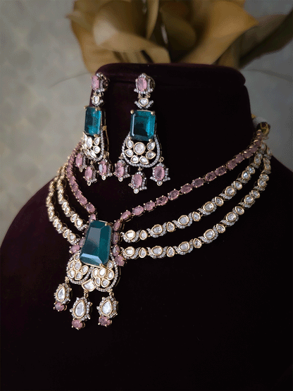 Three layer moissanite set with green stone center and one coloured stone layer