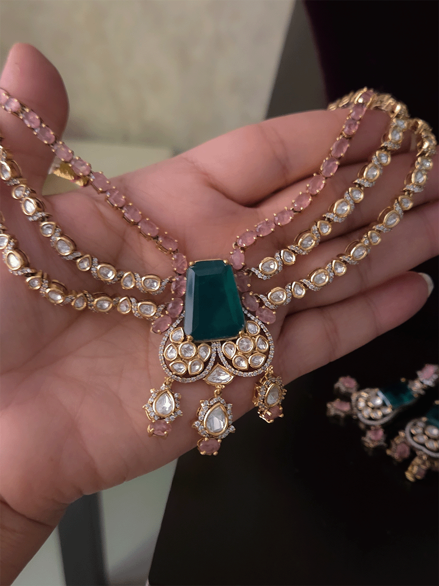 Three layer moissanite set with green stone center and one coloured stone layer