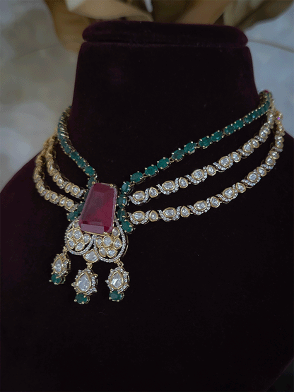 Three layer moissanite set with green stone center and one coloured stone layer