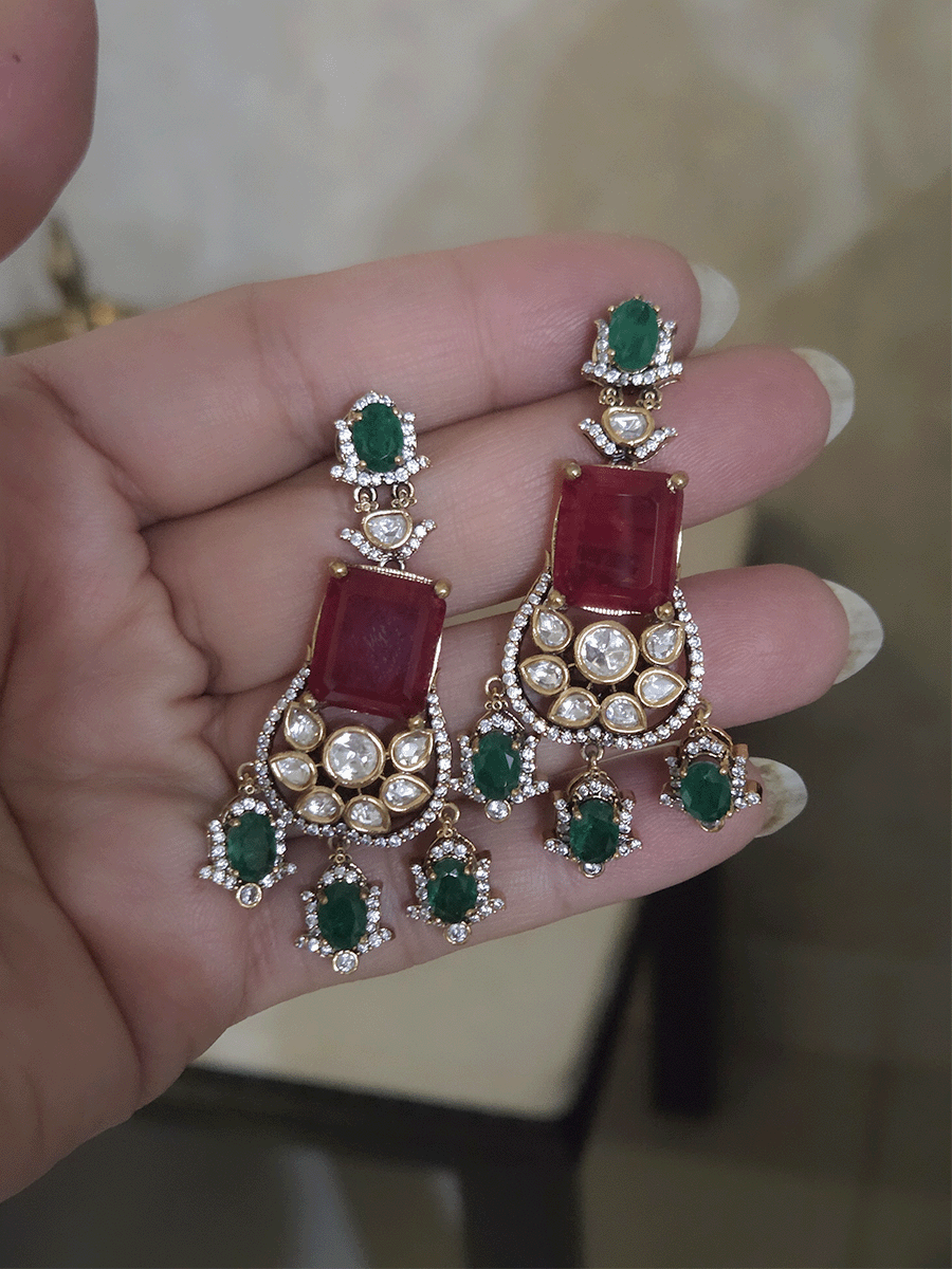 Three layer moissanite set with green stone center and one coloured stone layer