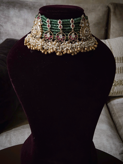 Traditional design kundan tukdies in eight aqua bead strings set