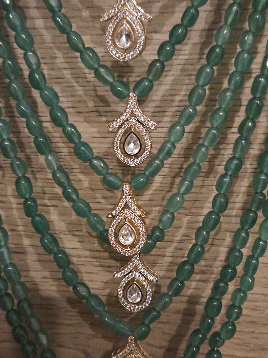 Seven layer leaf design moissanite tukdies in center 17 inch long necklace with triangular side brooches