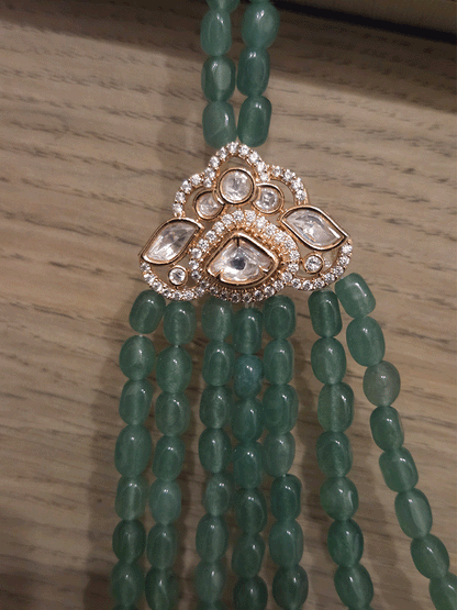 Seven layer leaf design moissanite tukdies in center 17 inch long necklace with triangular side brooches