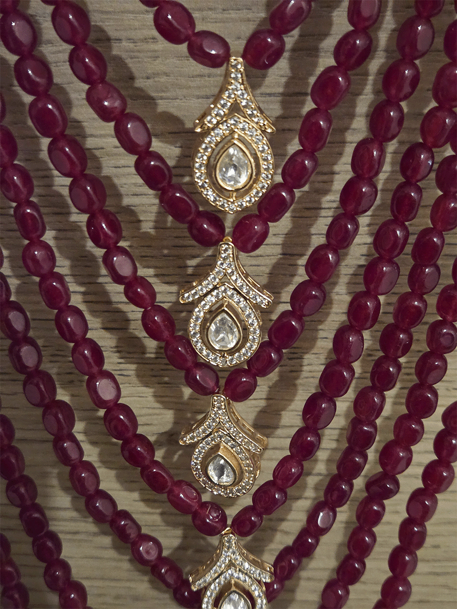 Seven layer leaf design moissanite tukdies in center 17 inch long necklace with triangular side brooches