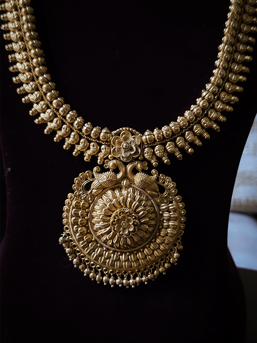 Flower design with peacock top pendant set with paisley design 11 inch long side string