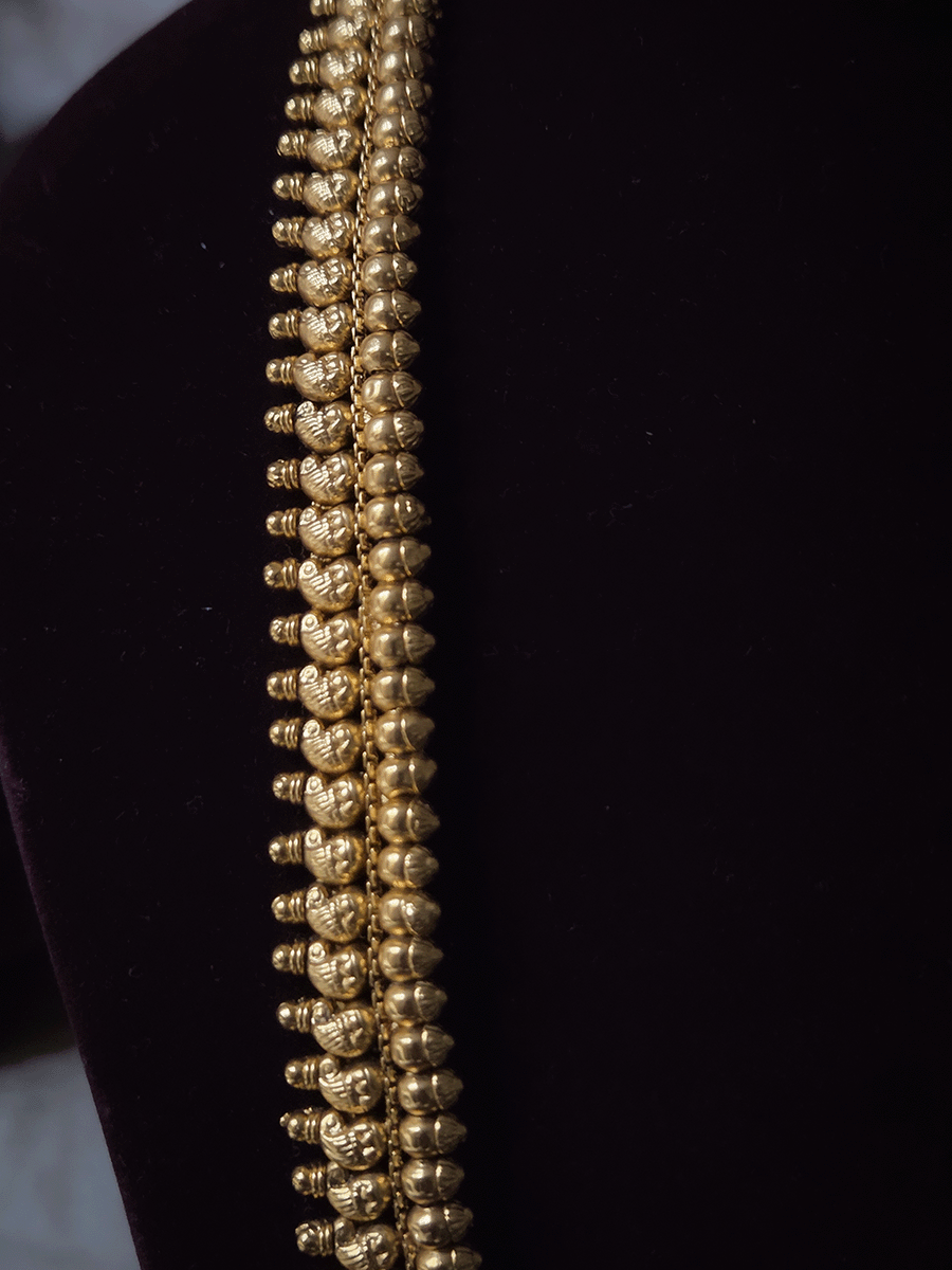 Flower design with peacock top pendant set with paisley design 11 inch long side string