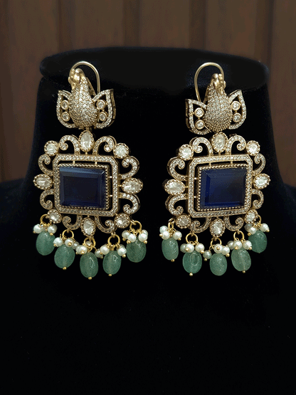 Rectangular middle stone pendant with peacock top moissanite set with aqua drops