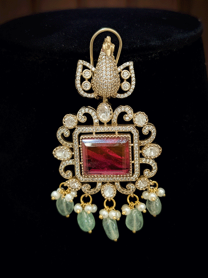 Rectangular middle stone pendant with peacock top moissanite set with aqua drops