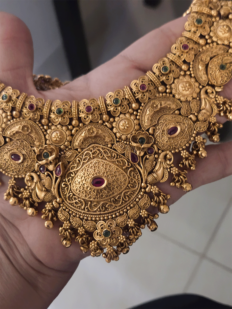 Flowers,paisley and peacock design intricately carved stones studded set