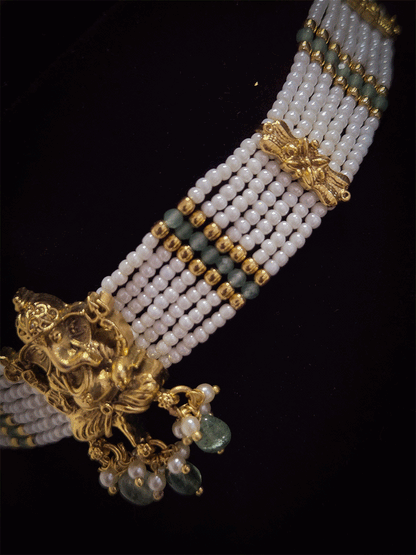 Ganpatiji motif in center with side cheed strings chik set with aqua drops