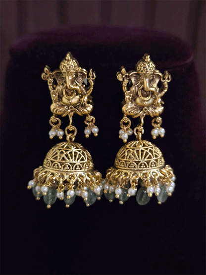 Ganpatiji motif in center with side cheed strings chik set with aqua drops