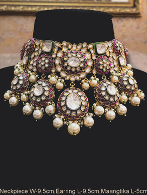 Royal kundan broad choker set with pearl drops and green meenakari work