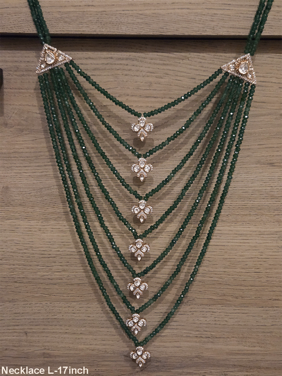 Seven layer onyx beads with half flower moissanite tukdies in center 17 inch long necklace