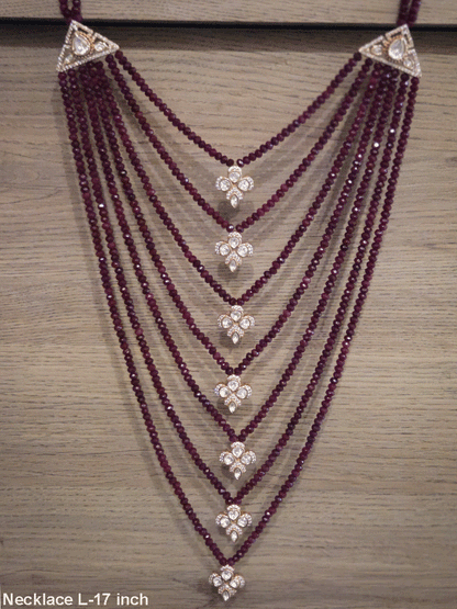 Seven layer onyx beads with half flower moissanite tukdies in center 17 inch long necklace