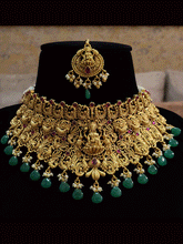 Load image into Gallery viewer, Broad green and ruby drops laxmiji choker set with intricate peacock motifs