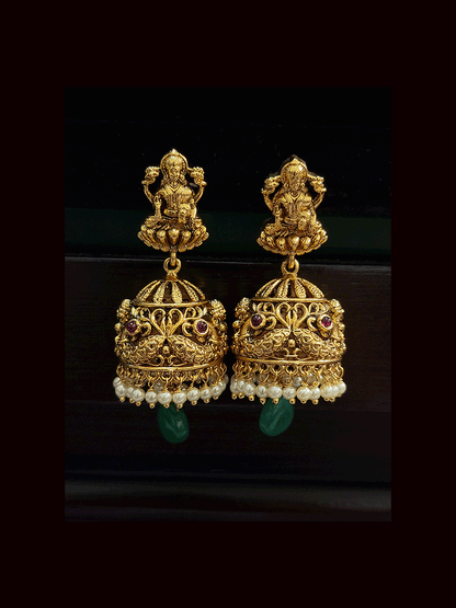 Broad green and ruby drops laxmiji choker set with intricate peacock motifs