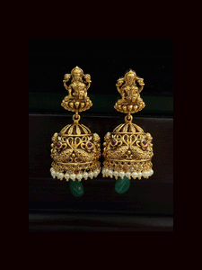 Broad green and ruby drops laxmiji choker set with intricate peacock motifs