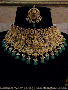 Broad green and ruby drops laxmiji choker set with intricate peacock motifs