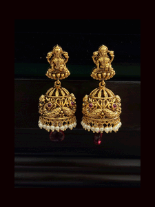 Broad green and ruby drops laxmiji choker set with intricate peacock motifs