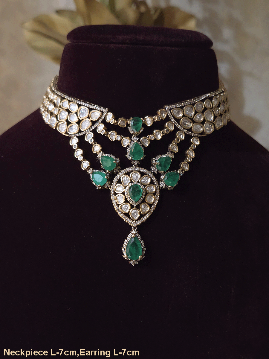 Moissanite set with connecting moissanite tukdies with green tear drop stones set