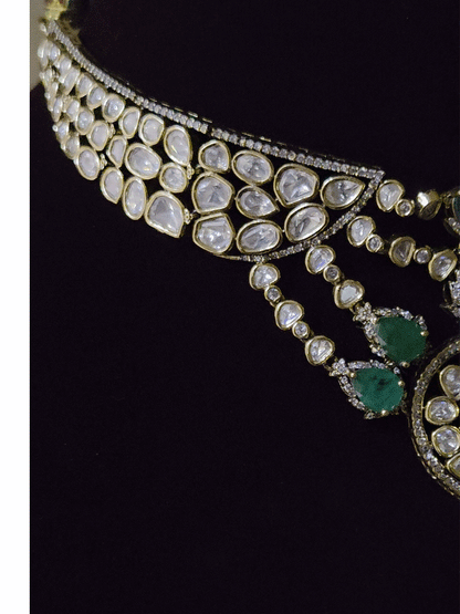 Moissanite set with connecting moissanite tukdies with green tear drop stones set