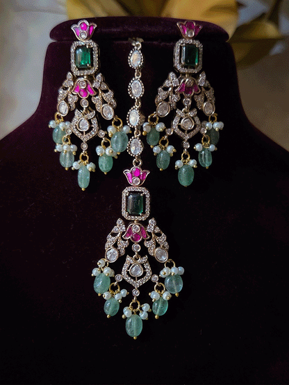 Rectangular green stones with hanging moissanite tukdies and ruby flower design antique gold finish set