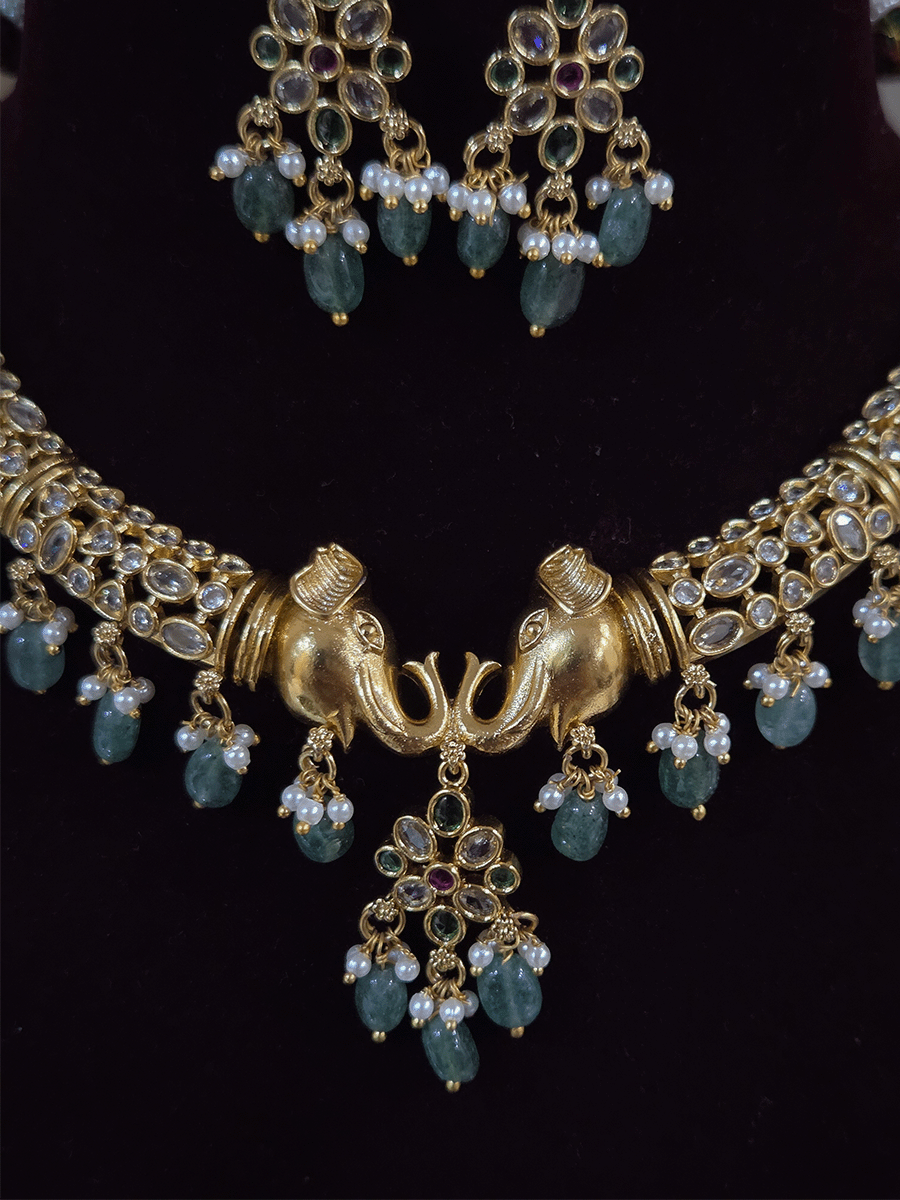 Elephant mouth center with jade drops polki embedded hasli set