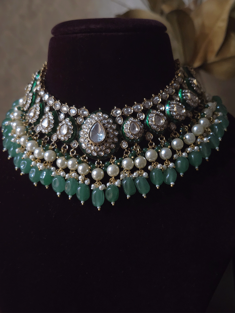 Green enamel tear drop shaped tukdies kundan set with pearl and jade green drops