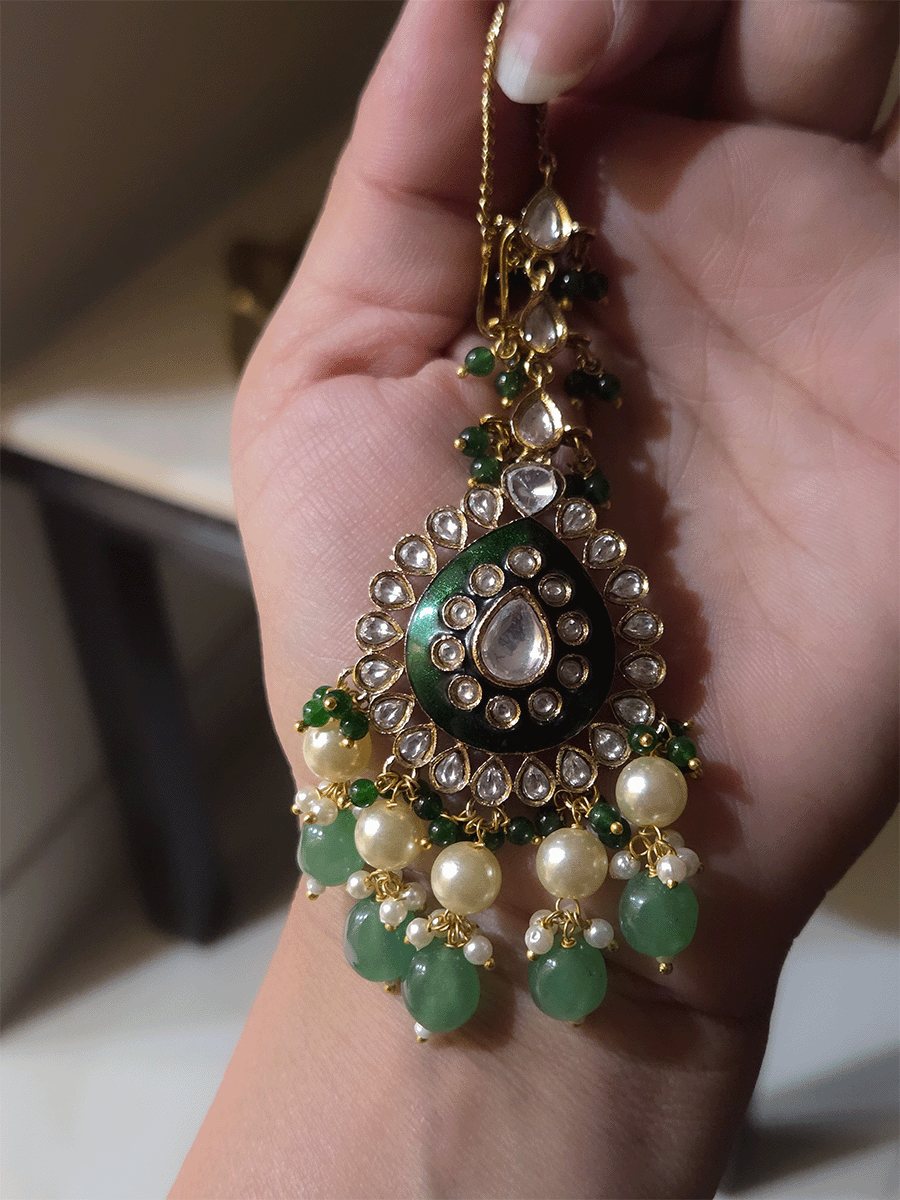 Green enamel tear drop shaped tukdies kundan set with pearl and jade green drops
