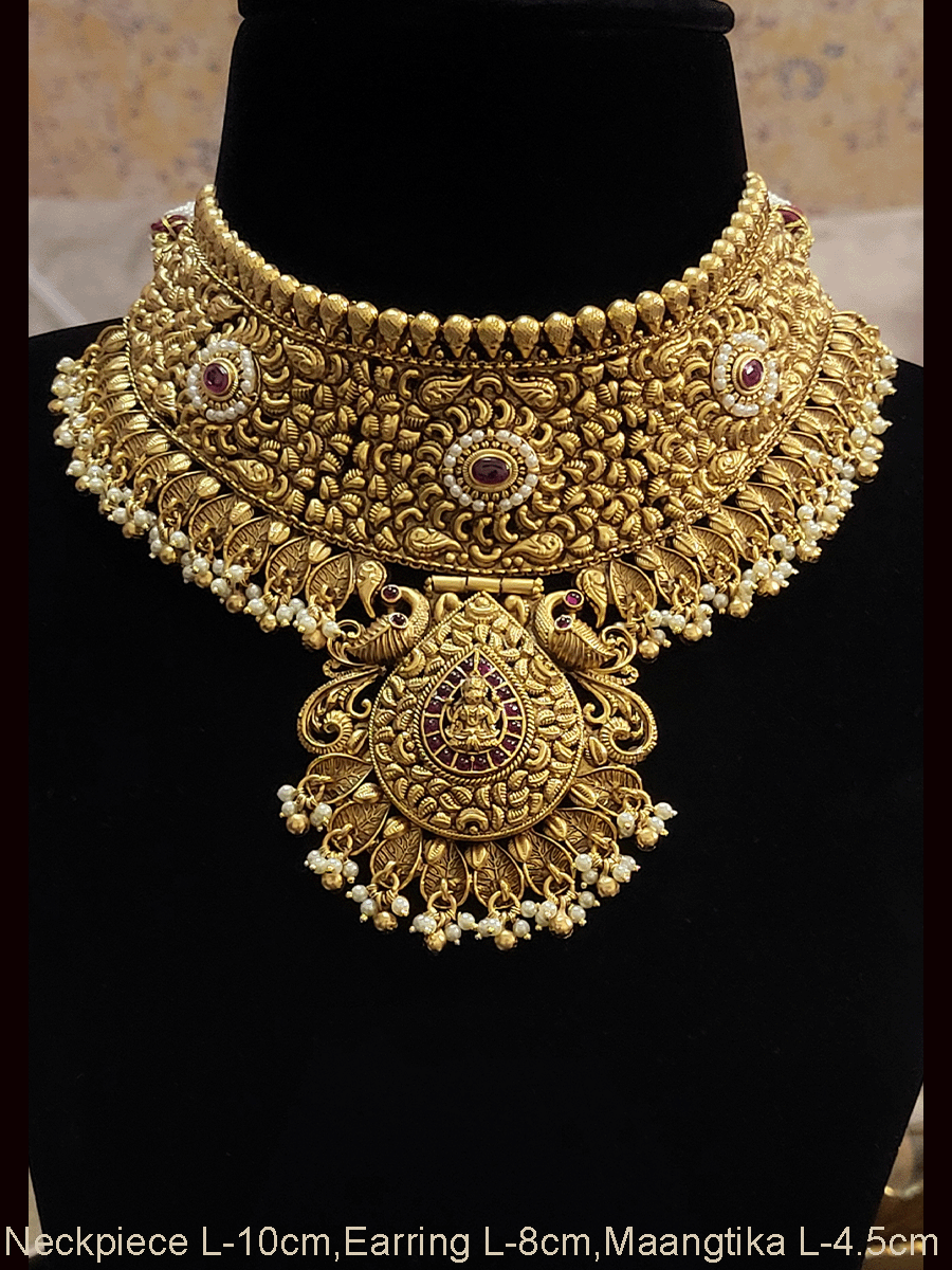 Laxmiji motif in leaf design center with peacock sides broad choker set with intricate paisley work