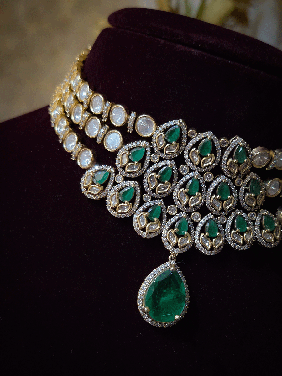 Green stones studded triple layer moissanite set with green tear drop hanging