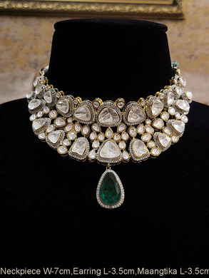 Broad kundan set with tear drop shaped green stone drop with AD outline