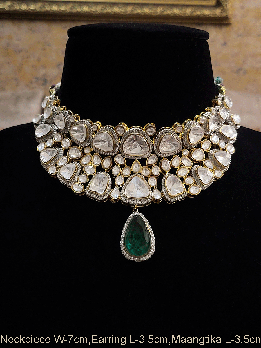 Broad kundan set with tear drop shaped green stone drop with AD outline
