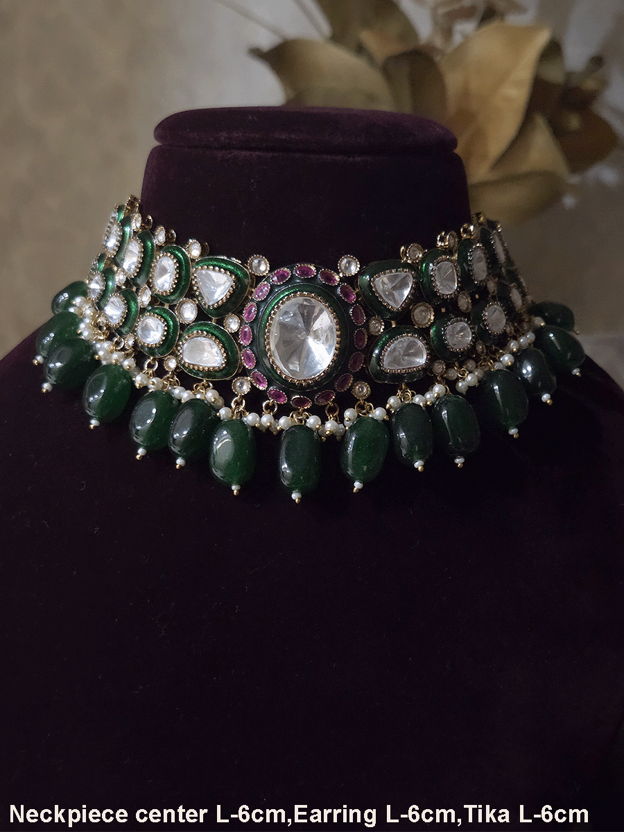 Bold oval uncut polki in center of green enamel choker set with green hanging beads