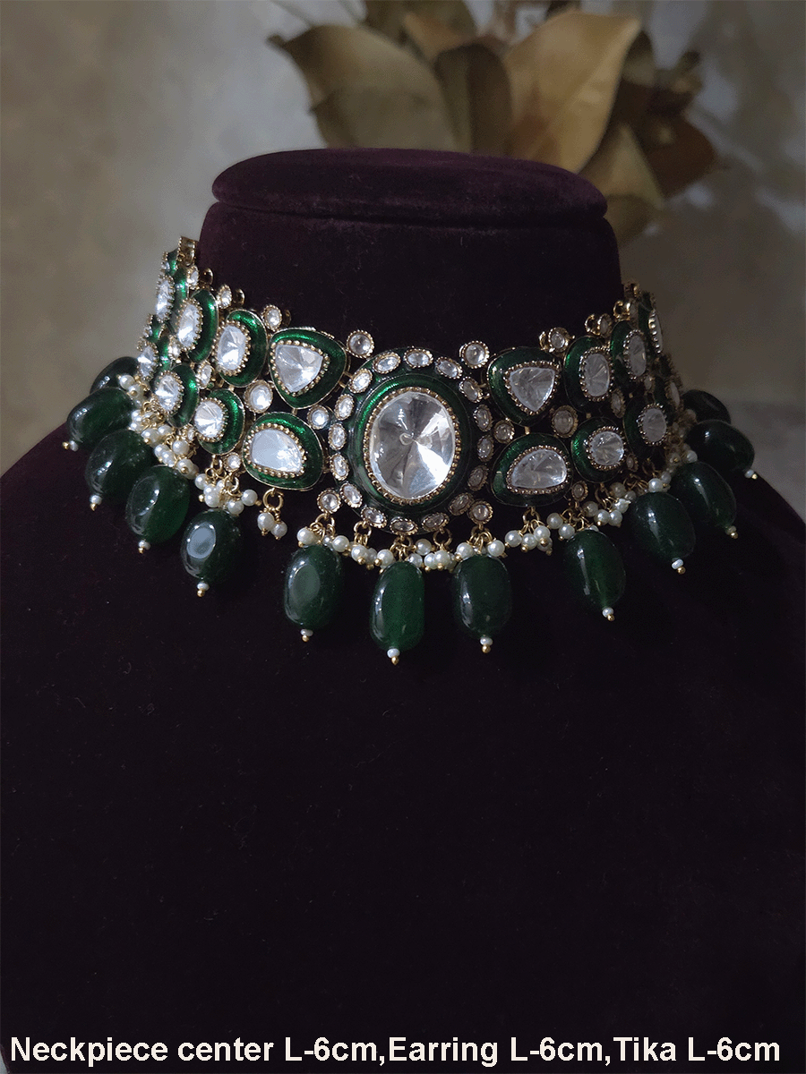 Bold oval uncut polki in center of green enamel choker set with green hanging beads