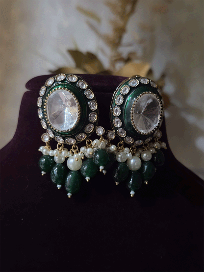 Bold oval uncut polki in center of green enamel choker set with green hanging beads