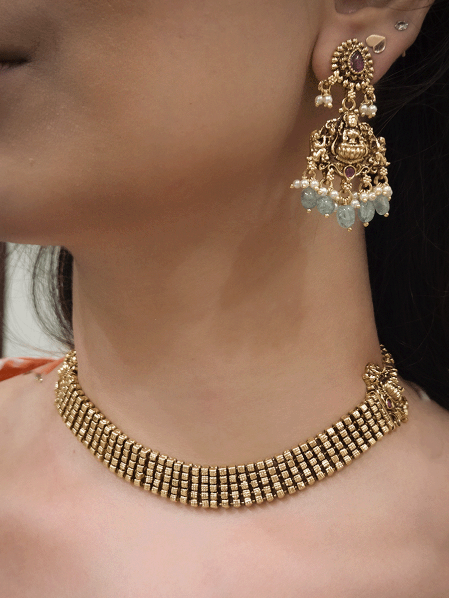 Broad chain with laxmiji side brooches set with laxmiji motif earrings