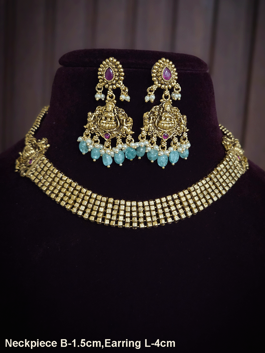 Broad chain with laxmiji side brooches set with laxmiji motif earrings