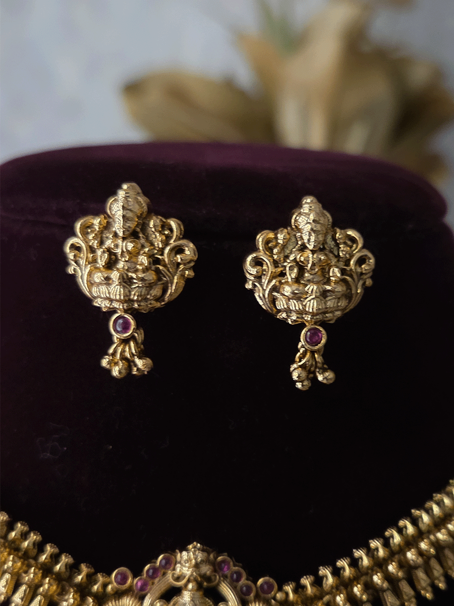 Ruby stones studded laxmiji motif set with side classy design chain